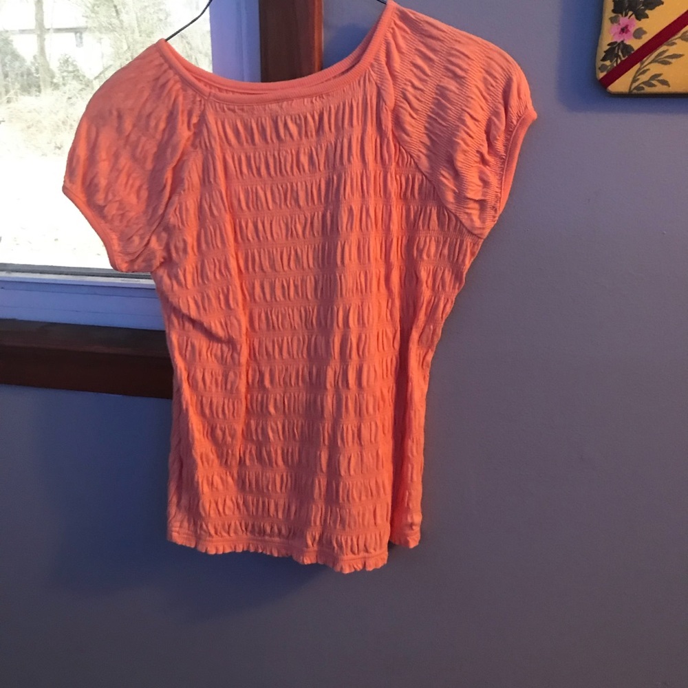 Orange ruffles shirt